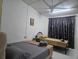 Fotografie z fotogalerie ubytování Homestay Iliana v destinaci Kangar + 8 fotografií