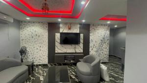 Μια τηλεόραση ή/και κέντρο ψυχαγωγίας στο GG suites and Apartments