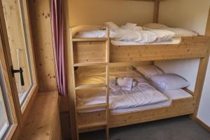 Ένα ή περισσότερα κρεβάτια σε δωμάτιο στο Beautiful luxury Chalet Veyon