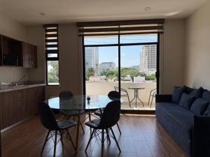 Χώρος καθιστικού στο Depa A unas calles de la Playa y Zona Dorada ByGPS