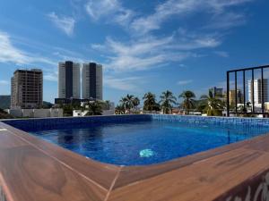 Πισίνα στο ή κοντά στο Depa A unas calles de la Playa y Zona Dorada ByGPS