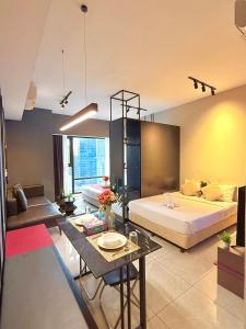 Ένα ή περισσότερα κρεβάτια σε δωμάτιο στο AXON LUXURY-Suites +73 φωτογραφίες