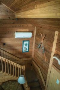 an attic view of a log cabin with a ceiling at MORNING GLORY - Cabin for 2 in Oak Creek in Indian Gardens +1 photo