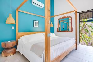 Voodi või voodid majutusasutuse Favela Chic Boutique Bungalows - Adults Only toas +34 fotot