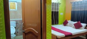 Postel nebo postele na pokoji v ubytování Zeromiles Green Park