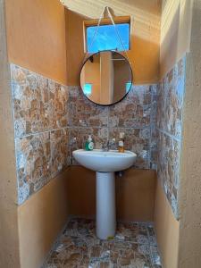 Koupelna v ubytování Shumba Camping Site + 26 fotografií