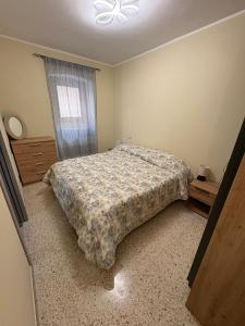 Postel nebo postele na pokoji v ubytování Il Cardellino