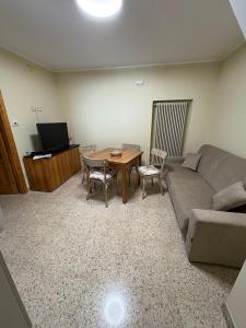 TV a/nebo společenská místnost v ubytování Il Cardellino + 2 fotografie