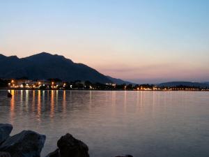 a view of a body of water at night at Marathon Eco Stay in Marathon