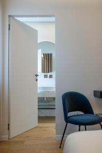 En eller flere senge i et værelse på Villa Galentino Suite Room