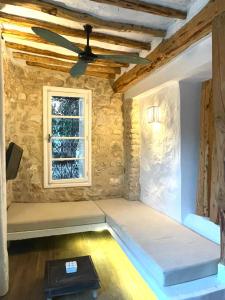 Ένα ή περισσότερα κρεβάτια σε δωμάτιο στο Casa Dea - Bungalow Aphrodite