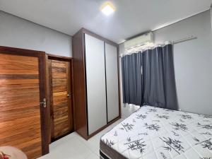 Postel nebo postele na pokoji v ubytování Casa J&L