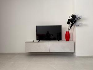 TV a/nebo společenská místnost v ubytování Hakuna Matata