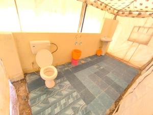 Ένα ή περισσότερα κρεβάτια σε δωμάτιο στο Jaisalmer Miracle Luxury Resort +42 φωτογραφίες