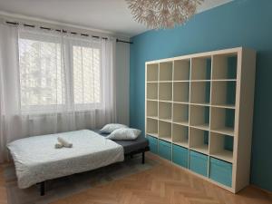 Ένα ή περισσότερα κρεβάτια σε δωμάτιο στο Apartmán PREDMESTSKÁ