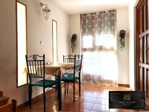 Posezení v ubytování Aqua Duplex Apartman