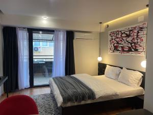 Postel nebo postele na pokoji v ubytování Mickitos Boutique Apartments