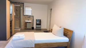 Ένα ή περισσότερα κρεβάτια σε δωμάτιο στο Hoa Xuan Pension