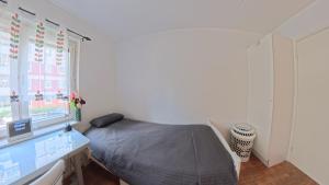 Postel nebo postele na pokoji v ubytování Easy Access To Stockholm City