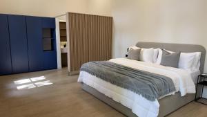 Postel nebo postele na pokoji v ubytování Hotel Boutique Ubuntu + 22 fotografií