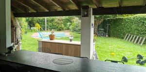 a view of a backyard with a table and a pool at Espectacular casa en Olivos in Olivos