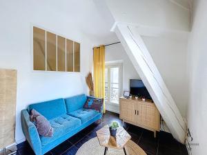 TV a/nebo společenská místnost v ubytování Le Week - 5 min Palais - 3 chambres - WIFI