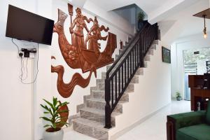 TV a/nebo společenská místnost v ubytování Pearl Vista Ella