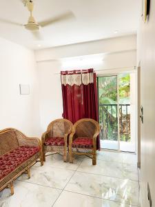 Posezení v ubytování Radhakrishna Residency + 7 fotografií