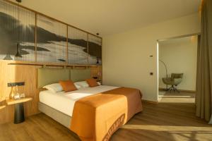 Postel nebo postele na pokoji v ubytování Água Hotels Terra Fria + 23 fotografií