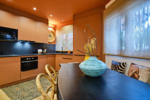 Kuchyň nebo kuchyňský kout v ubytování El Samburu - Apartamento Premium inspirado en África - Grupo Querbes