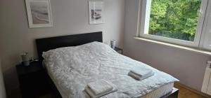 Ένα ή περισσότερα κρεβάτια σε δωμάτιο στο Apartament Gdynia Babie Doły +32 φωτογραφίες