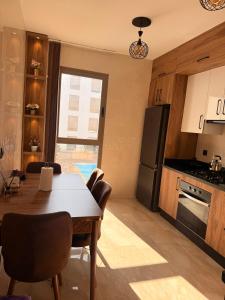 Kuchyň nebo kuchyňský kout v ubytování Appartement de luxe Agadir Bay près plage