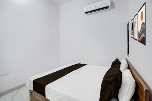 Postel nebo postele na pokoji v ubytování HOTEL O VIP HILL HOMESTAY