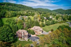 an aerial view of a home in the mountains at Creekside Hideaway at The Farm in Banner Elk