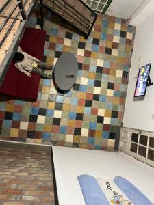 Μια τηλεόραση ή/και κέντρο ψυχαγωγίας στο Apart Santa Ana de los Indios Guácaras