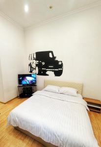 Ένα ή περισσότερα κρεβάτια σε δωμάτιο στο Kyiv Gelik Apartment