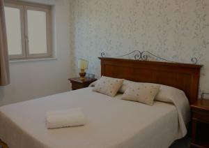 Postel nebo postele na pokoji v ubytování Agriturismo Green Planet