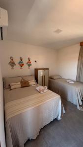 Postel nebo postele na pokoji v ubytování Pousada Vista do Pôr do Sol + 5 fotografií