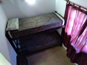 Ένα ή περισσότερα κρεβάτια σε δωμάτιο στο Triplex Oro San Bernardo