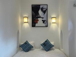 Ένα ή περισσότερα κρεβάτια σε δωμάτιο στο Top Riad 6 persons 5 minutes main square