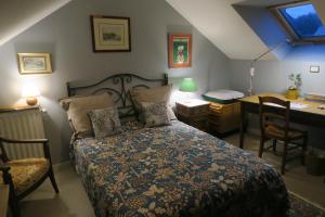 Postel nebo postele na pokoji v ubytování Chez Hervé