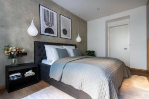 Ένα ή περισσότερα κρεβάτια σε δωμάτιο στο Stylish Apartment in Prague's Historic Centre