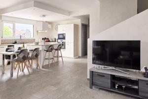 Μια τηλεόραση ή/και κέντρο ψυχαγωγίας στο Maison chaleureuse Alsace - Marché de Noël à Colmar