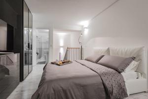 Ένα ή περισσότερα κρεβάτια σε δωμάτιο στο Gramsci Prestige Apartment