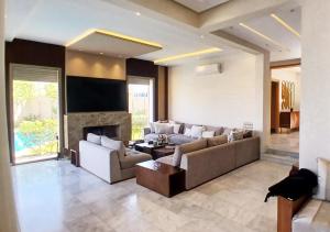 Posezení v ubytování Villa Élégance Familiale