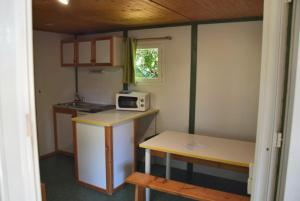 Kuchyň nebo kuchyňský kout v ubytování Pôle Bellevue