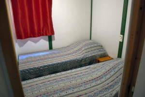 Postel nebo postele na pokoji v ubytování Pôle Bellevue