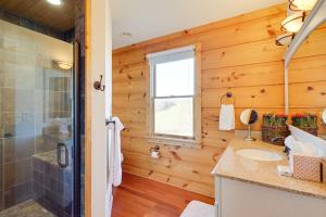 a bathroom with a shower and a sink at Decks and Panoramic Views Rustic Sparta Cabin in Sparta +26 photos