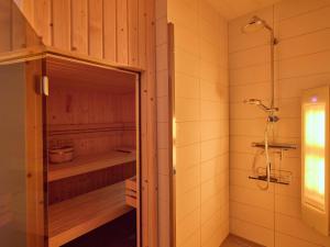 a bathroom with a shower and a walk in shower at Sauna Zee 27H in Colijnsplaat +24 photos