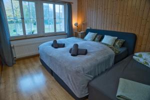 Postel nebo postele na pokoji v ubytování Kiwi Chalet - Mountain Views & Cozy NZ Vibes